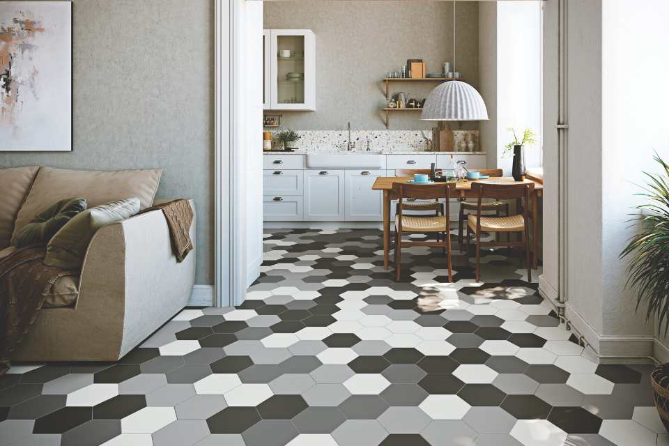 black, white, and grey hexagon tiles in contemporary living room leading into kitchen